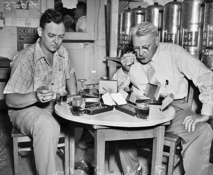 Gus P. Menger and son Albert testing coffee — UTSA San Antonio Light Collection