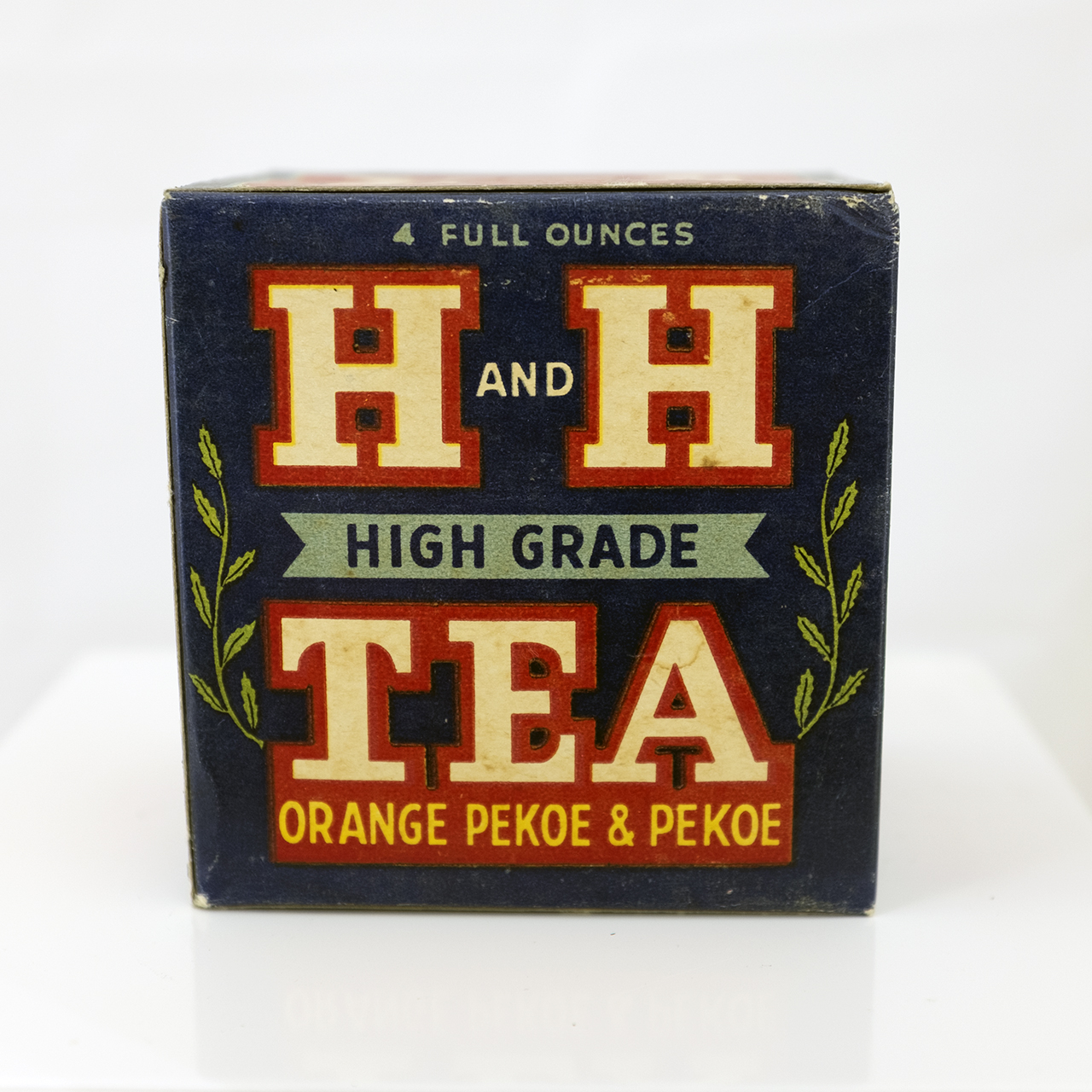 H and H High Grade Orange Pekoe tea carton