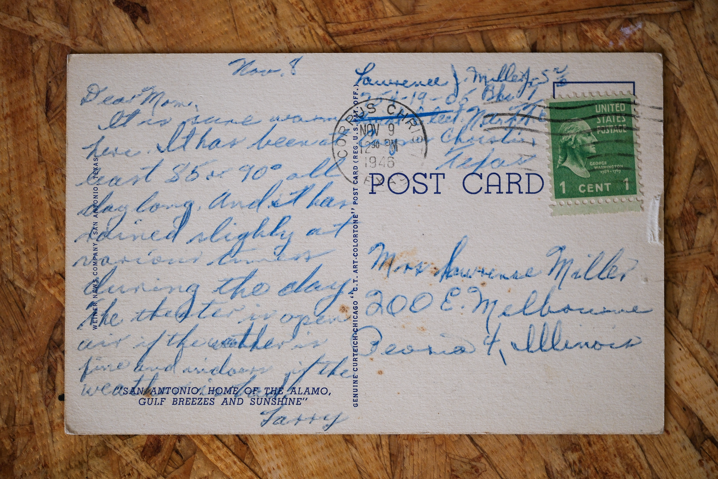Reverse of the postcard: a 1-cent Washington stamp with a Texas duplex cancel, and a handwritten message signed "Larry" addressed to Mrs. Lawrence Miller, 200 E. Melbourne, Peoria 4, Illinois.