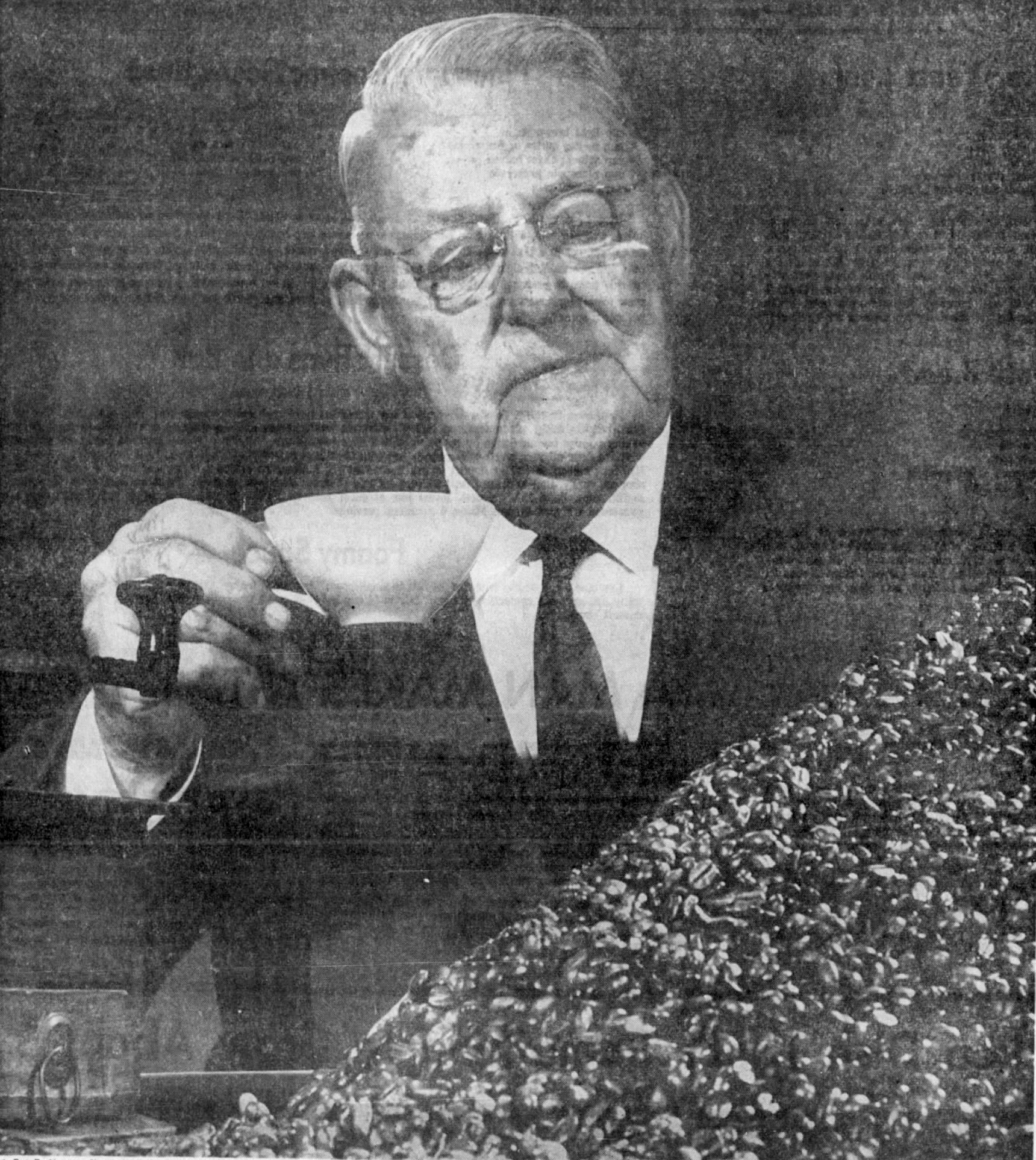 Gus P. Menger portrait, beans, grinder — “Dean of Coffee Roasters” caption, 29 Mar 1962 Express-News