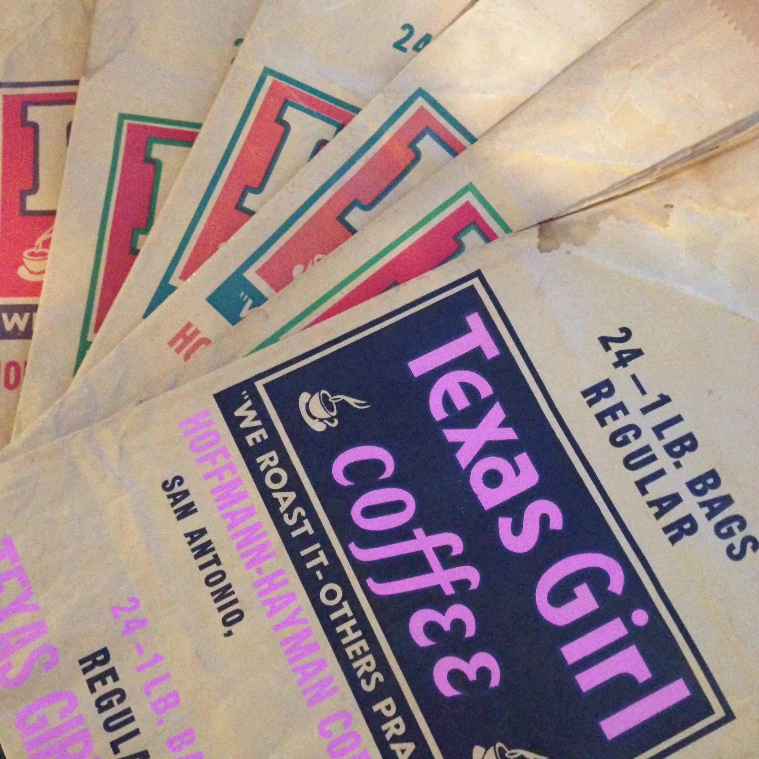 Fan of Texas Girl Coffee shop bags, 24—1 lb regular, Hoffmann–Hayman San Antonio, magenta and navy with H monogram