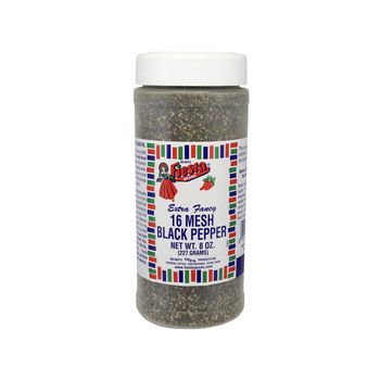 Studio product photograph — Bolner's Fiesta Brand Extra Fancy 16 Mesh Black Pepper, net wt. 8 oz (227 g), clear plastic bottle with white shaker cap; label with Fiesta folklórico logo, confetti border, Bolner's Fiesta Products Inc. San Antonio; **not** Hoffmann–Hayman merchandise — documents retail **16 mesh** black pepper line discussed in context of reported reuse of H and H industrial grinding equipment at Fiesta (see blog [Bolner grinder post]({{ site.baseurl }}/bolner-fiesta-h-and-h-coffee-grinder-1971/)); project photo **15 January 2024** (`10279-20240115.jpg`)
