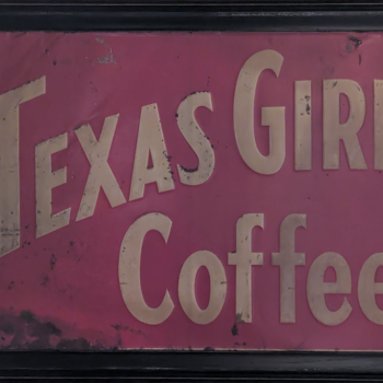 Texas Girl Coffee framed tin sign — cream block letters on a magenta field, photo courtesy Darin Grimsley, found in Kansas